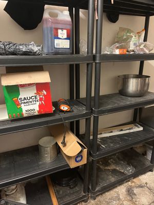 a shelf that has a bunch of items on it