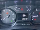 a close up of a car dashboard with various gauges and numbers