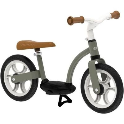 a toy bike with a wooden seat and a handlebar