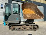 an image of a construction vehicle with a bucket on the back