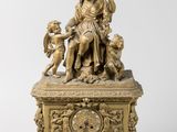 l'image d'une statue représentant une femme tenant un enfant dans ses bras