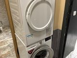 a washer and dryer stacked on top of each other