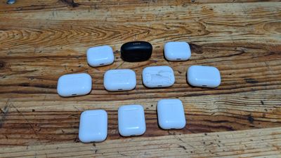 a black and white object sitting on a wooden table