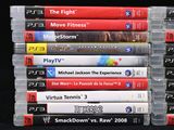 a lot of video games stacked on top of each other