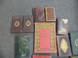 many books that are sitting on the floor together