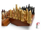 a chess board with a lot of chess pieces on it