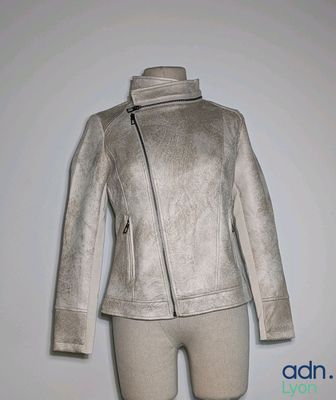 jacket on mannequin dummy on white background with white wall in background