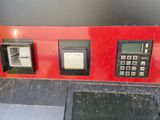 three different types of atm machines sitting on a counter