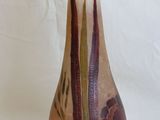 a vase with a design on it on a white background