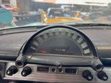 a dashboard of a car with a speedometer in it