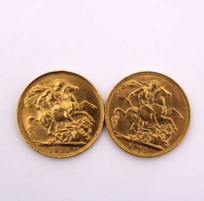 two british gold sovereigns, one of which is a horse and the other of which is a horse and