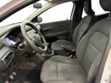 the interior of a car with a steering wheel and a dashboard