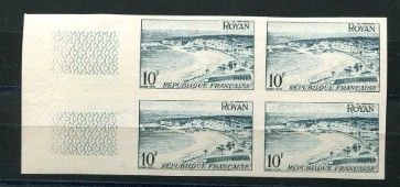 four stamps on a piece of paper with a picture of a golf course