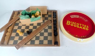 two pieces of chess and a box of biscuits on the table