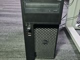 a desktop computer sitting on top of a desk in an office