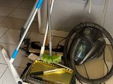 someone is cleaning the floor with a vacuum and a mop