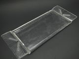une image représentant un plateau en verre transparent orné d'un motif