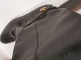 a black purse with a gold buckle on it