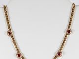 a close up of a necklace on a mannequin mannequin