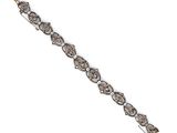 a close up of a diamond bracelet on a white background