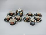an image of a group of cups and saucers sitting on a table