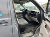the interior of a van with the door open and the driver ' s seat down