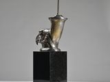 an image of a lamp that is on top of a table