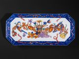 blue and white platter with a floral design on it