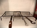 a rack with a bottle of wine and a pair of scissors on it