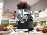 a picture of a meat grinder sitting on a kitchen counter