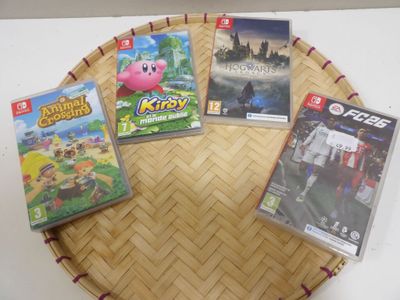 a lot of video games sitting on a table
