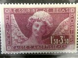 un vieux timbre sur lequel figure l'image d'un ange