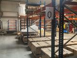 a large warehouse with lots of boxes on the shelves