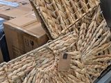 baskets stacked on top of each other on a cart in a store