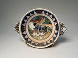 a close up of a plate with a horse and carriage on it