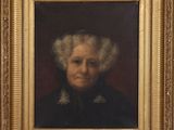 portrait d'une vieille femme en robe noire, dans un cadre doré