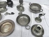 a lot of silver items that are on a table