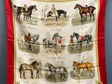 une image représentant une écharpe rouge avec des chevaux et des jockeys