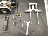a lot of tools that are laying out on a table