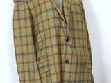a close up of a mannequin mannequin wearing a suit and tie