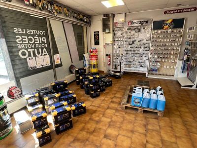 many bottles of alcohol on the floor in a store