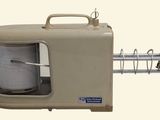 an image of a toaster with a basket on top of it