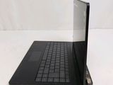 an open laptop computer sitting on top of a white table