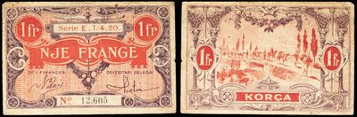 deux anciens billets de banque français sur lesquels figure, en arrière-plan, l'image d'une ville