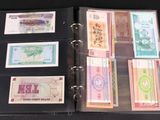 a binder with a lot of different currency notes on it