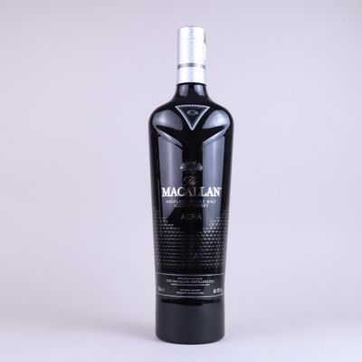 a bottle of macallan black wine on a white background