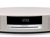 a clock that is on top of a radio