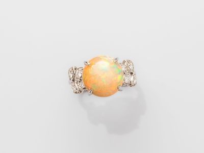 an oplite and diamond ring