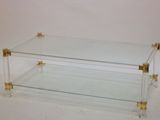 an image of a clear glass coffee table on a white background