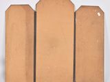 three pieces of wood are stacked on top of each other